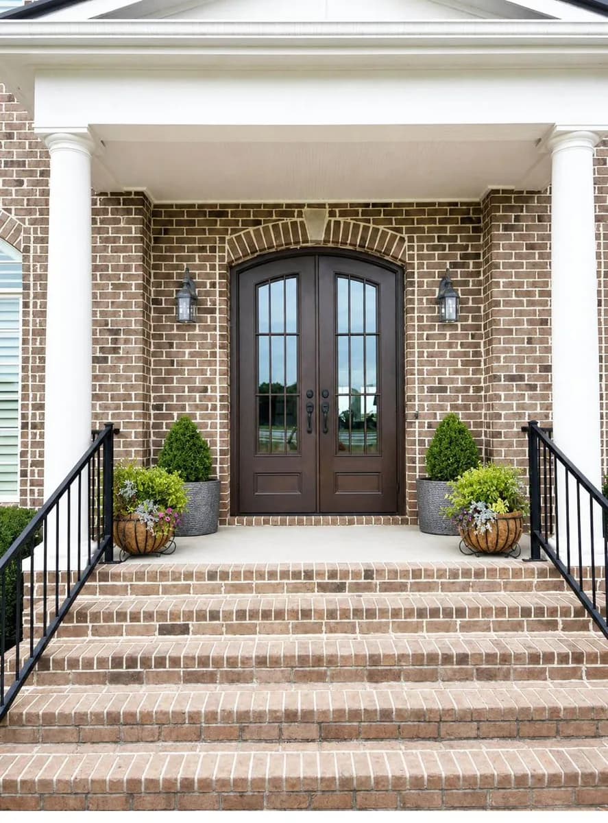 Double iron entry doors — featured local project in Madison, AL