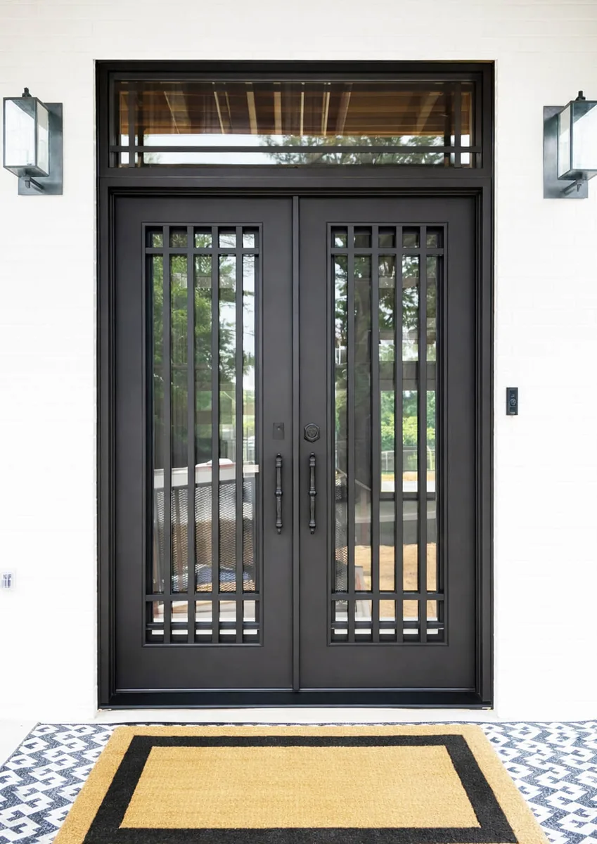 Double iron entry doors with transom — featured local project in Mountain Brook, AL