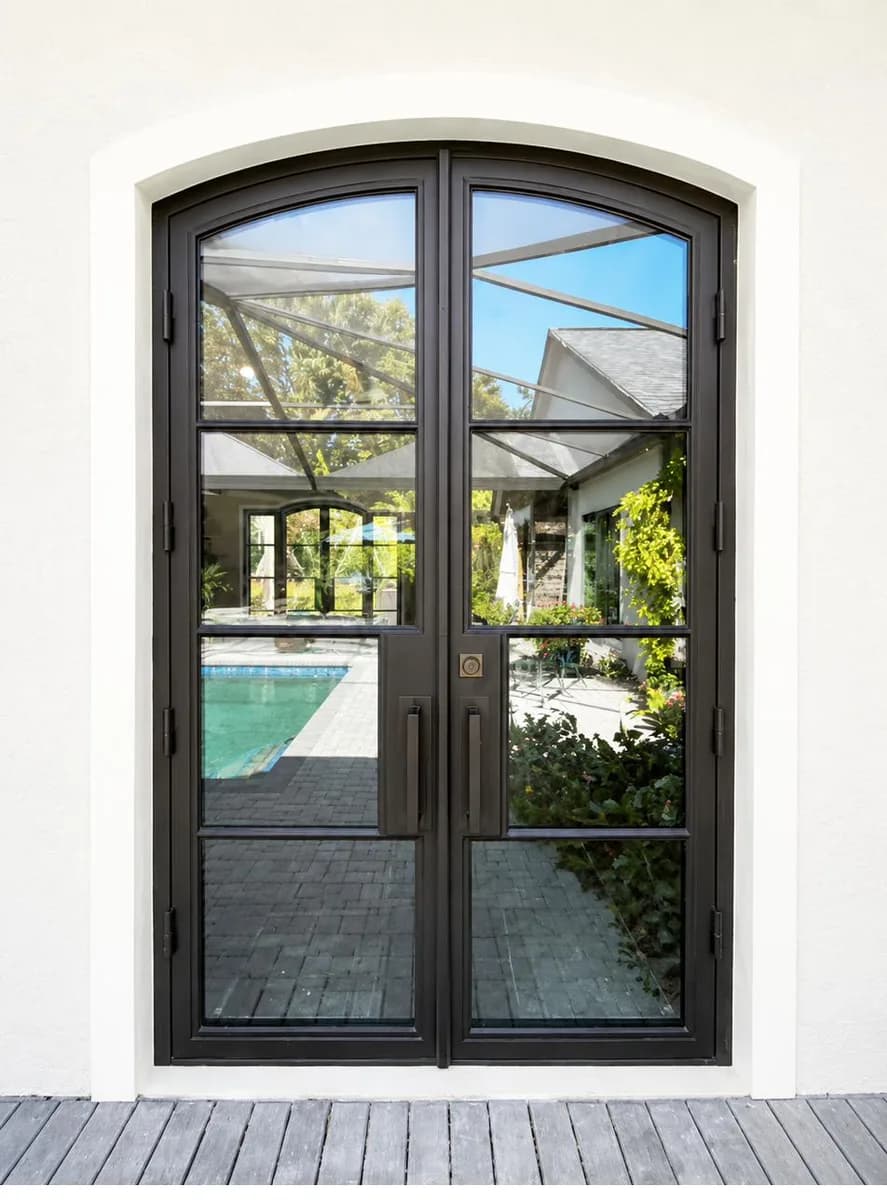 Double iron entry doors — featured local project in Delray Beach, FL