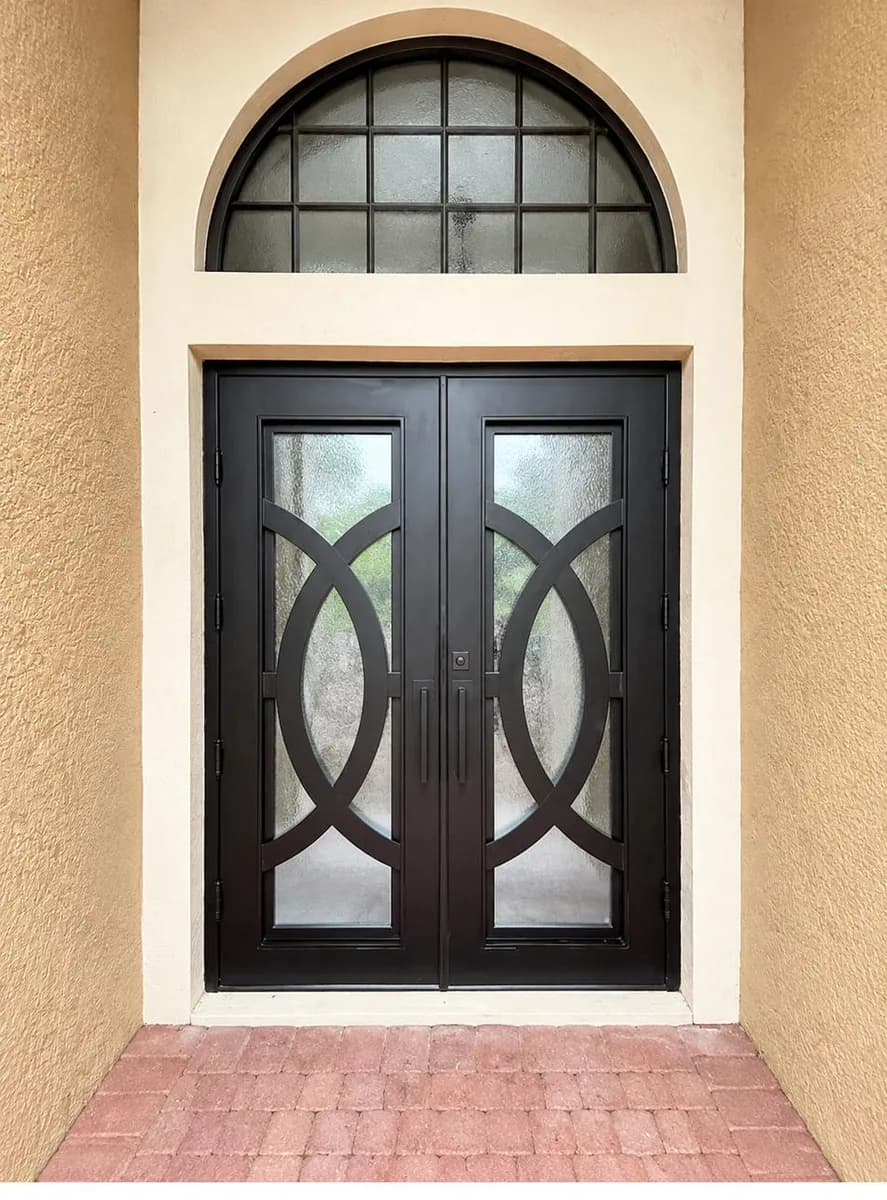 Double iron entry doors — featured local project in Estero, FL