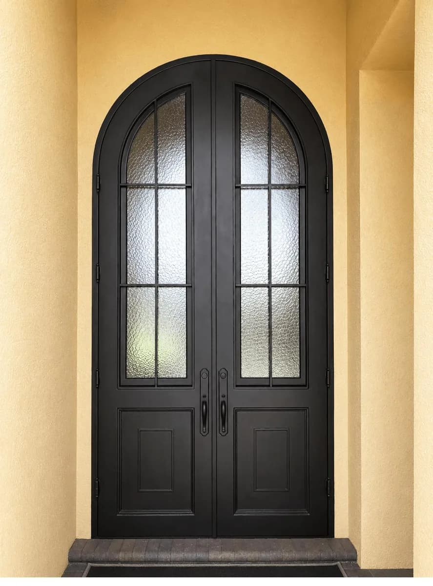 Double iron entry doors — featured local project in Stuart, FL