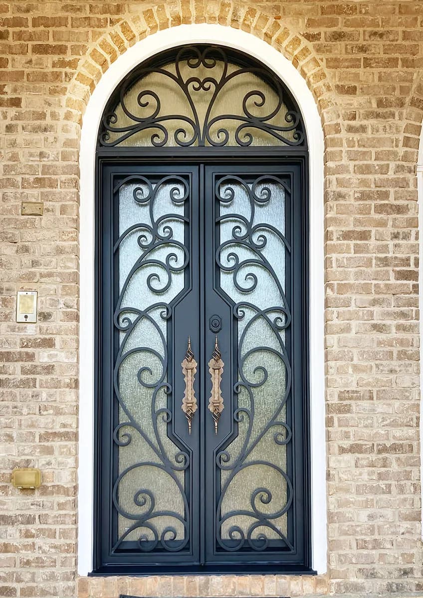 Double iron entry doors with transom — featured local project in Cary, NC