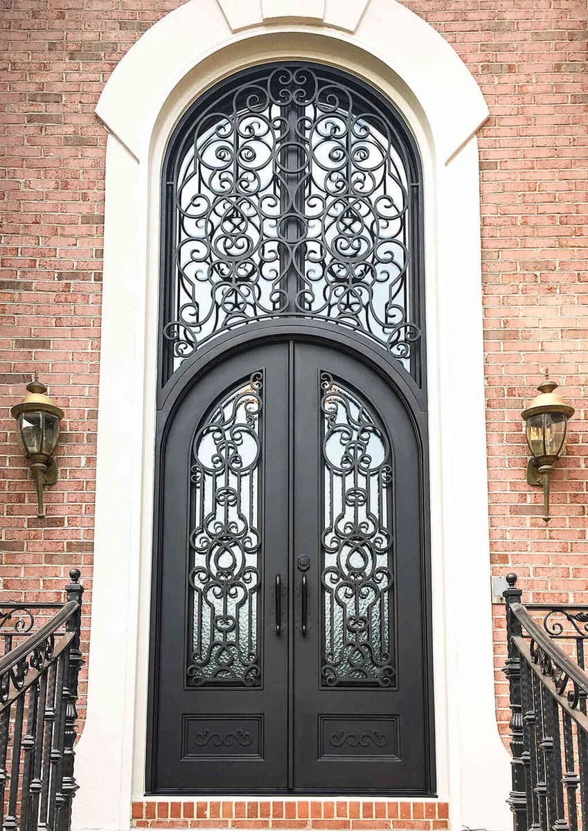Double iron entry doors with transom — featured local project in Greenville, SC