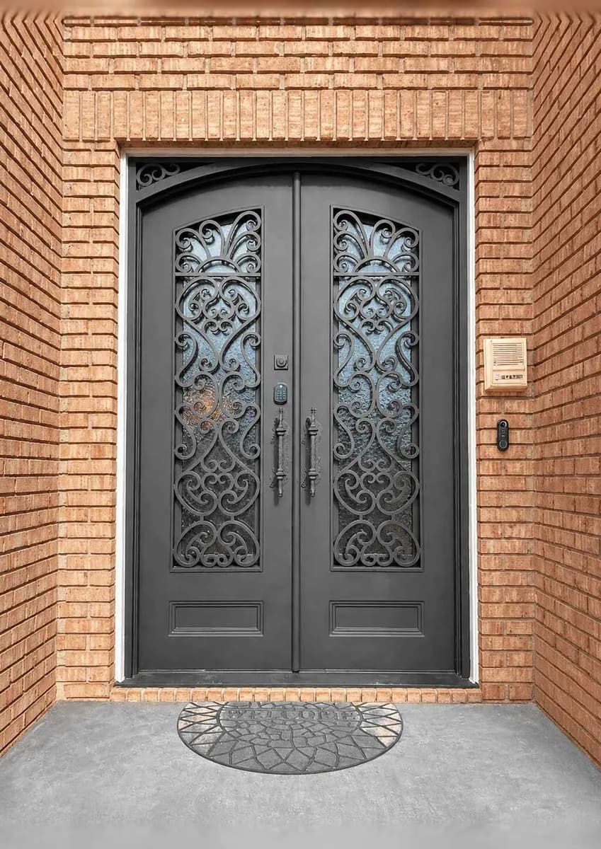 Double iron entry doors — featured local project in Marvin, NC