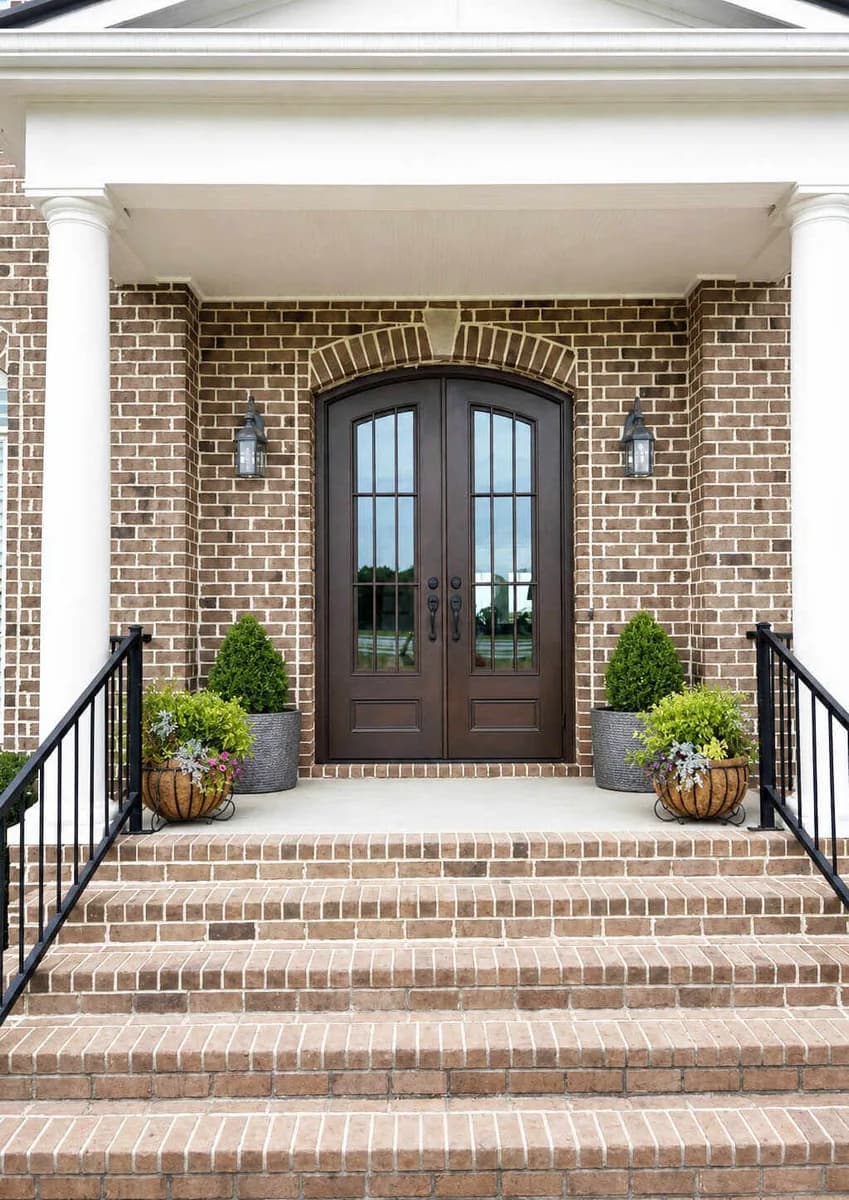 Double iron entry doors — featured local project in Weddington, NC