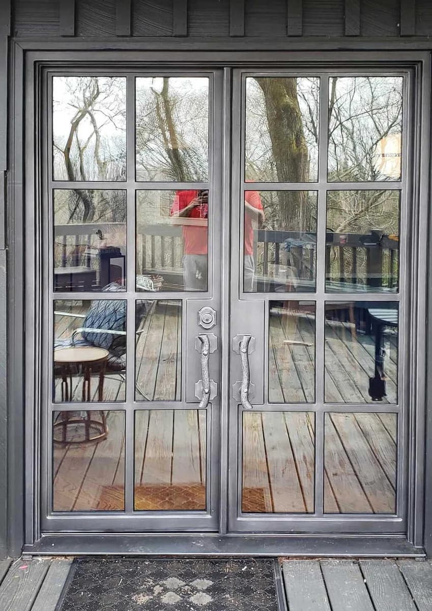 Double iron entry doors — featured local project in Weddington, NC