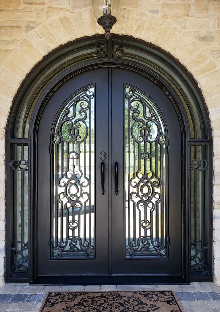 Double iron entry doors with sidelights — featured local project in Weddington, NC