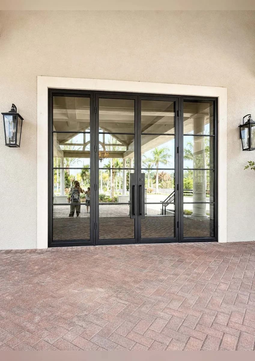 Double iron entry doors with sidelights — featured local project in Charleston, SC